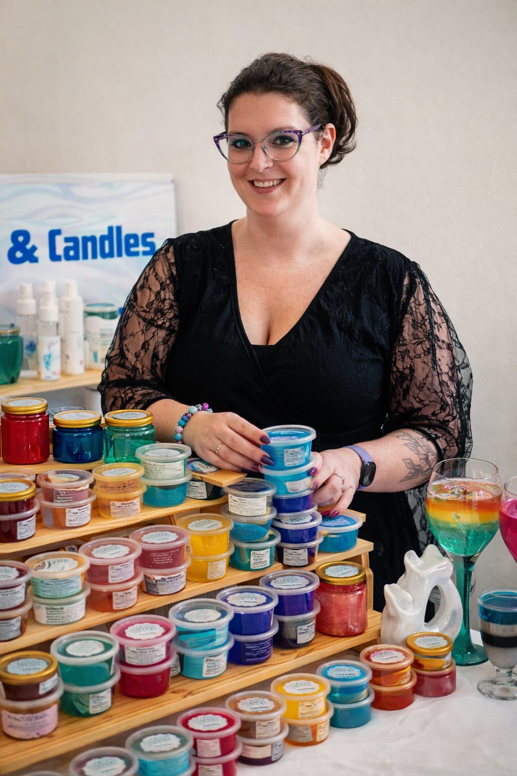 Lisa Crosby behind her stall of hand-poured jelly wax melts and candles