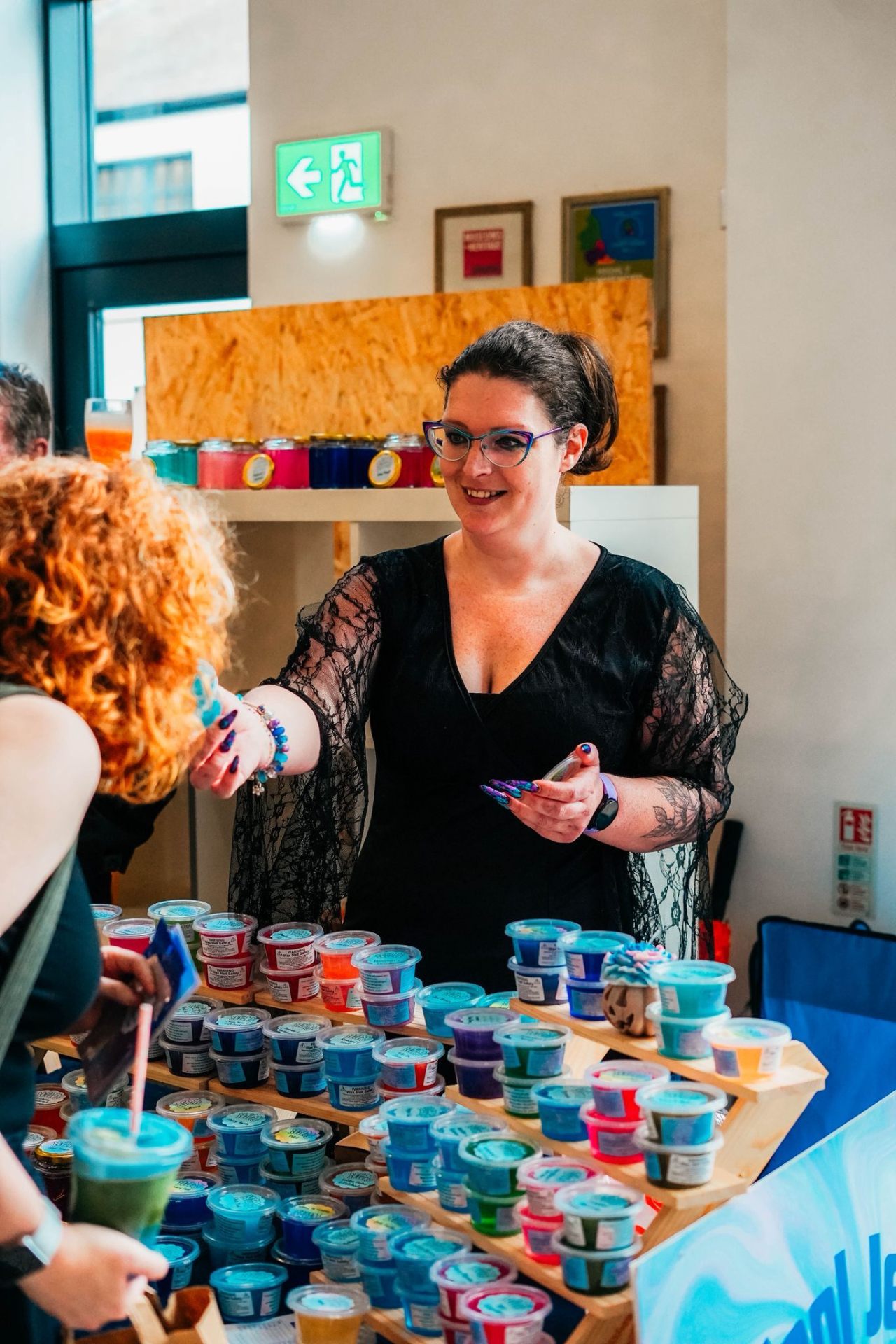 Founder with handmade wax melts and candles